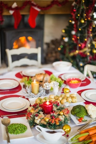 Christmas dinner table with food at home in the living room.jpeg